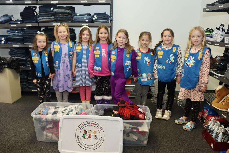 Daisy Scouts from Troop 193 in Milton dropped off two bins of cold-weather clothes to Clothing Our Kids in Millsboro Jan. 15. The clothing drive was a service project for the young scouts. Shown are (l-r) Aubrey Faryna, Adaline Dusza, Cassie Danz, Hayden Hatfield, Harper Hatfield, Audrey Slot, Elise Sarik and Elise T. BILL SHULL PHOTO